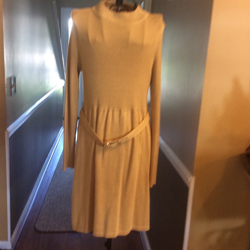 Gold color dress.